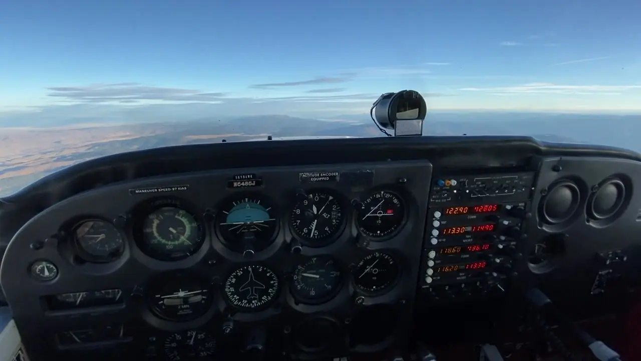 Instrument panel of the Cessna 172 above a cloud layer